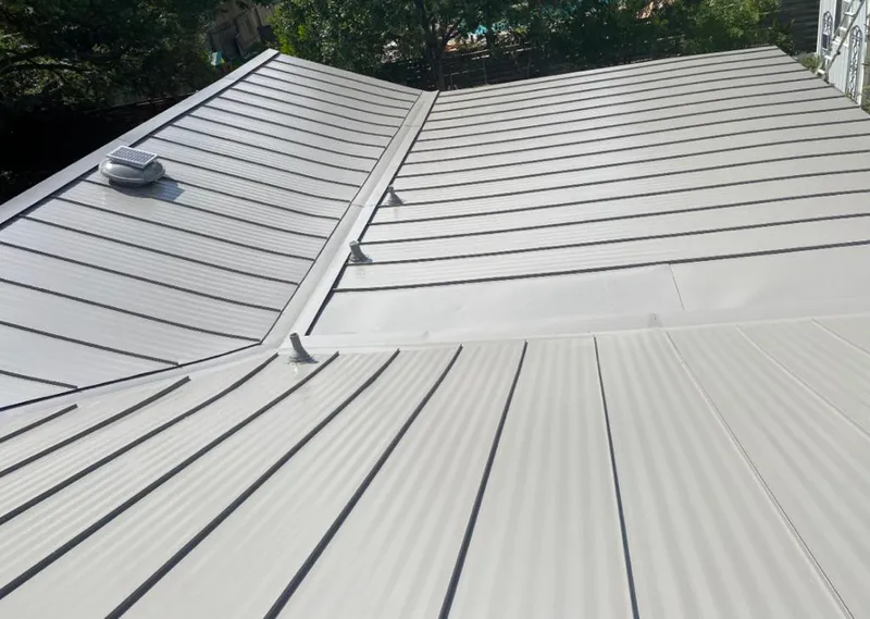 Solar attic fan installed on a metal roof for Roof Ventilation in New Braunfels