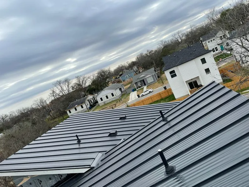 Standing seam metal roof panels with vents for Skylight Repair in New Braunfels